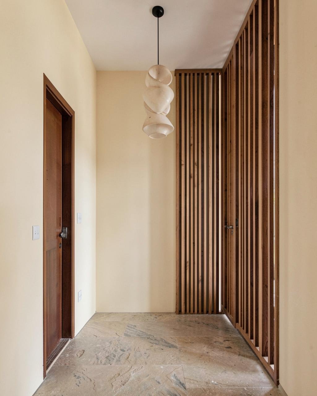 Entrance foyer interior design in Chennai with custom joinery by AK Interiors & Civil